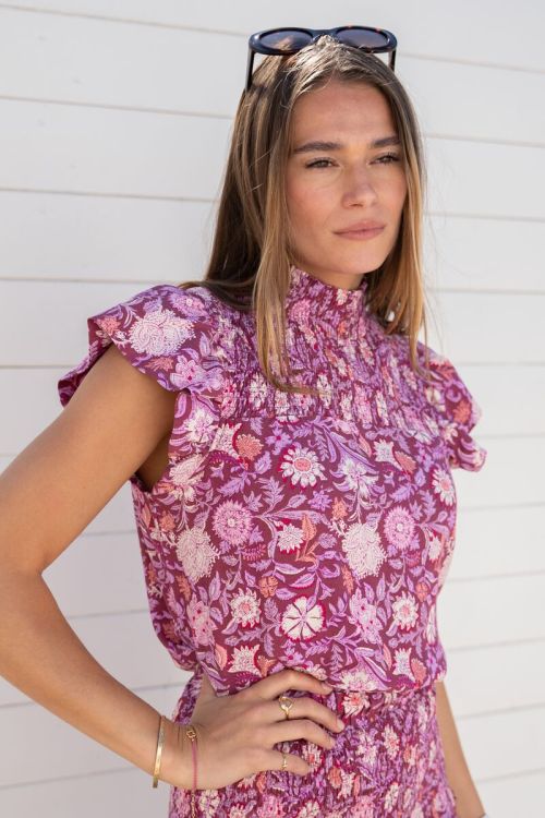 Purple top with pink floral print and smock | My Jewellery
