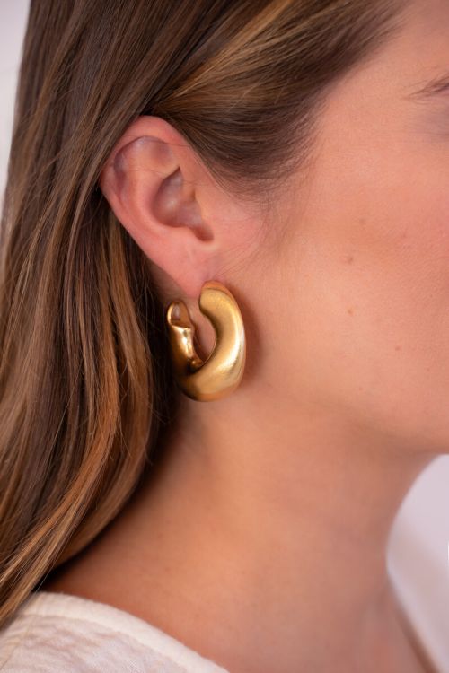 Bold statement earrings organic matte texture