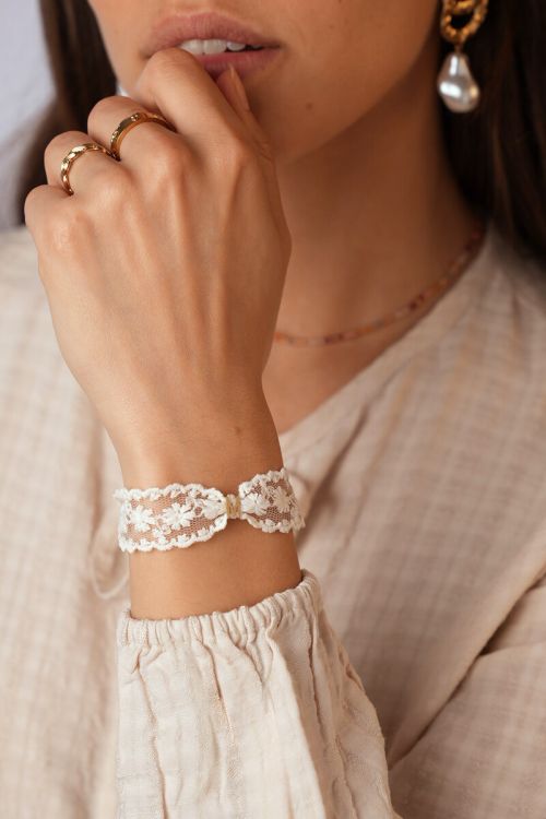 White bracelet with lace and initial