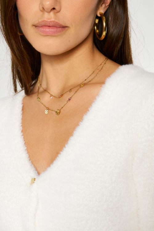 White cardigan with gold-coloured heart buttons | My Jewellery