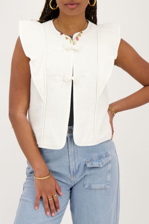 white gilet with bows and ruffles | My Jewellery