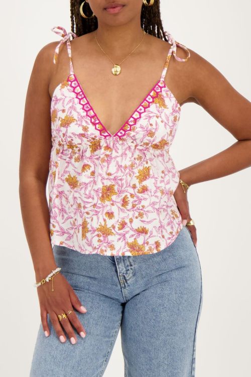 White top with pink floral print and bow ties  | My Jewellery
