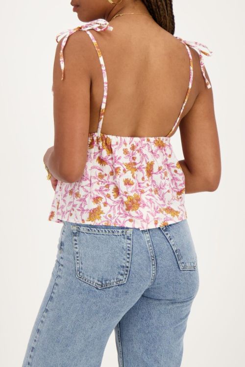 White top with pink floral print and bow ties  | My Jewellery