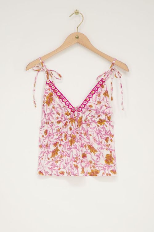 White top with pink floral print and bow ties  | My Jewellery