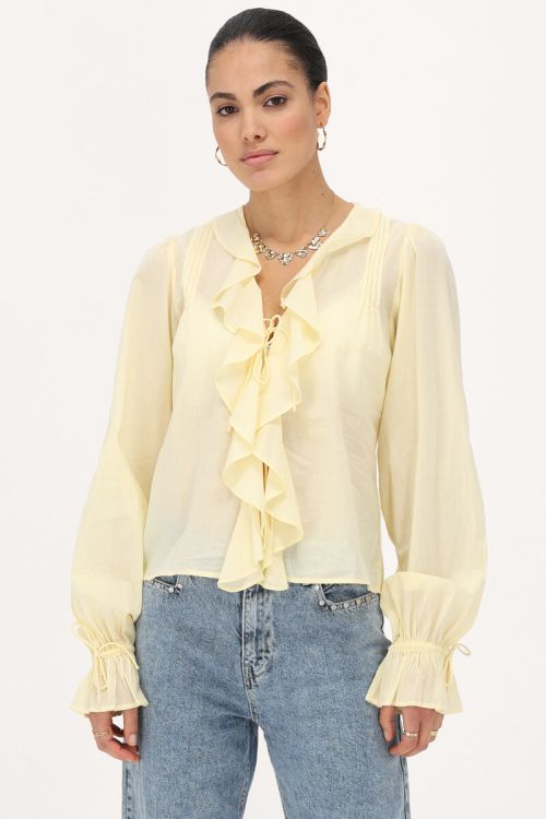 Yellow blouse with ruffles and bows