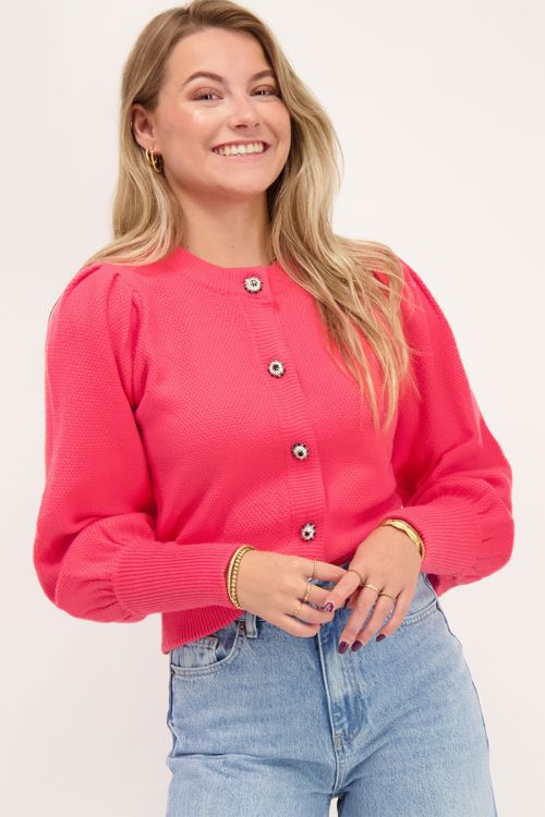 Roze vest met fantasie knoop