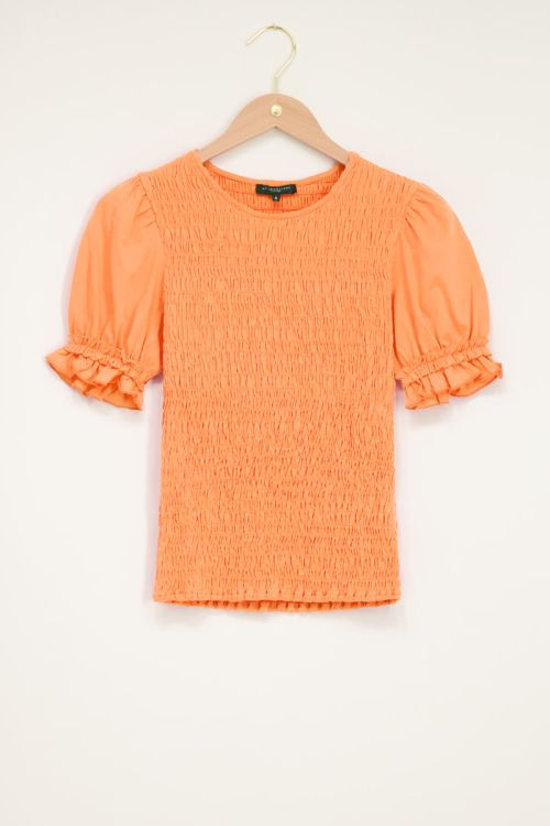 Oranje smock top met pofmouw