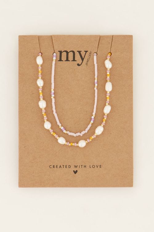 Souvenir oranje & witte kettingen set met kralen en parels | My Jewellery
