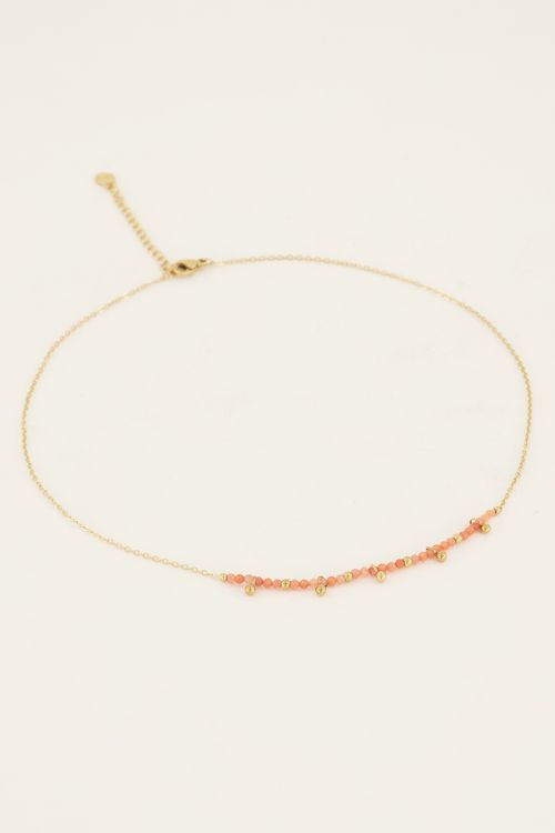 Vintage ketting met oranje kralen & bolletjes