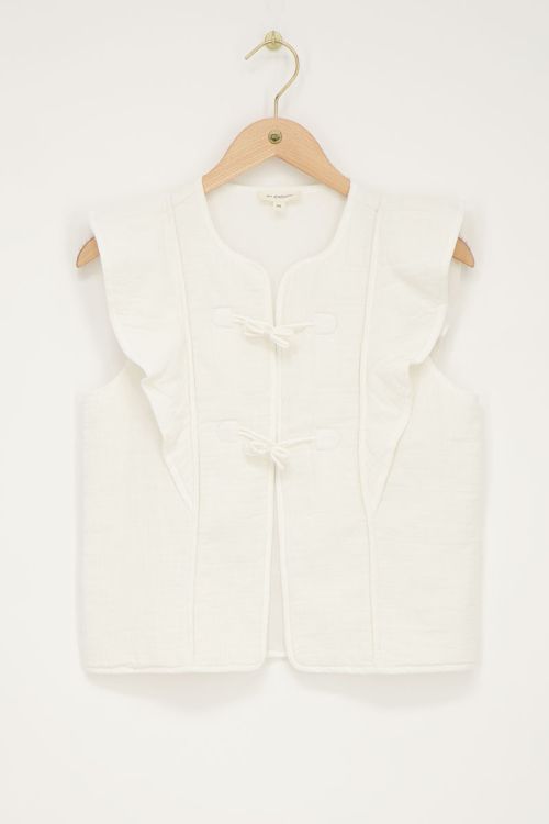 white gilet with bows and ruffles | My Jewellery