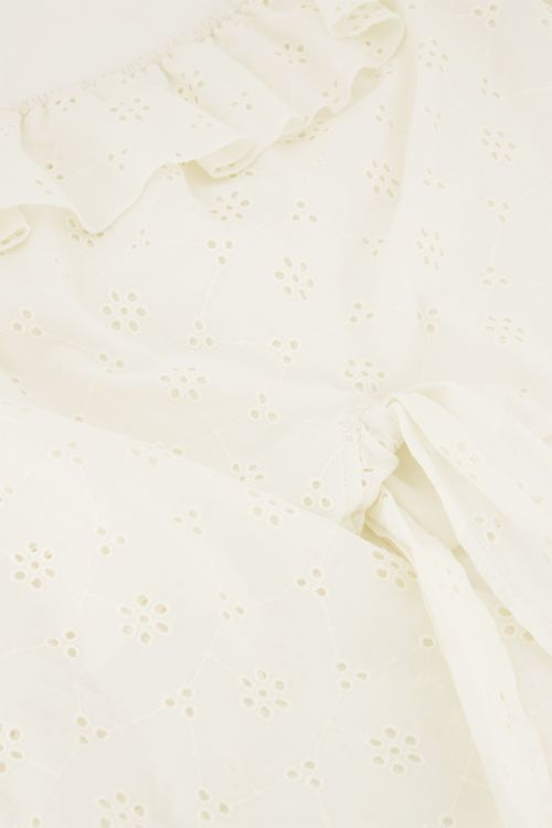 White off-shoulder top with embroidery and bow detail