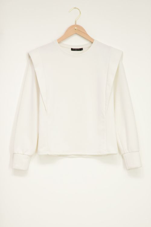 Witte sweater met schouderstukken