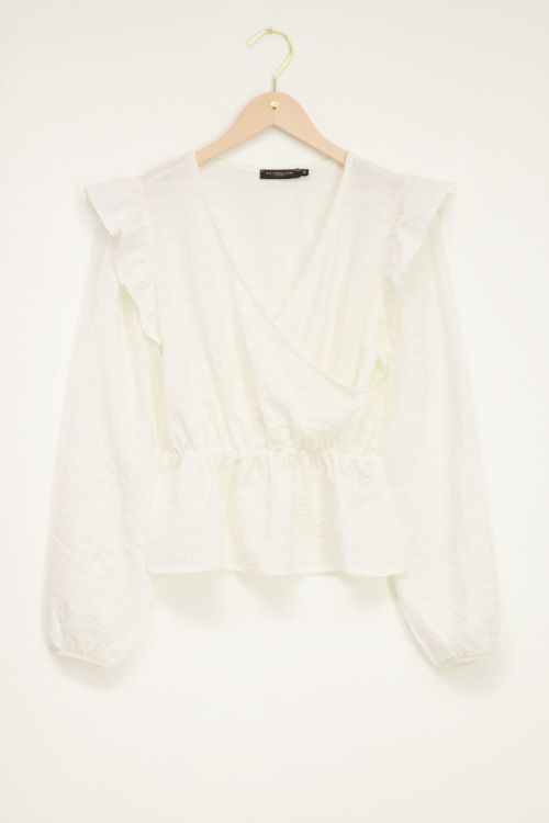 Witte wrap top met ruffles