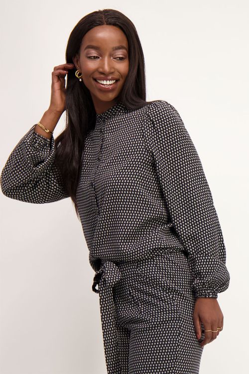 Zwarte blouse met klaver print