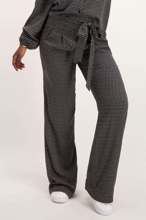 Zwarte broek met klaver print