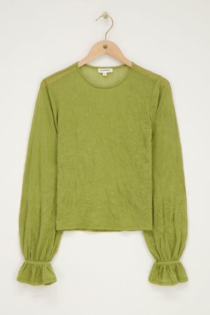 Grünes strukturiertes Oberteil mit Manschetten