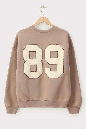 Beigefarbenes Sweatshirt mit Teddybär-Patch