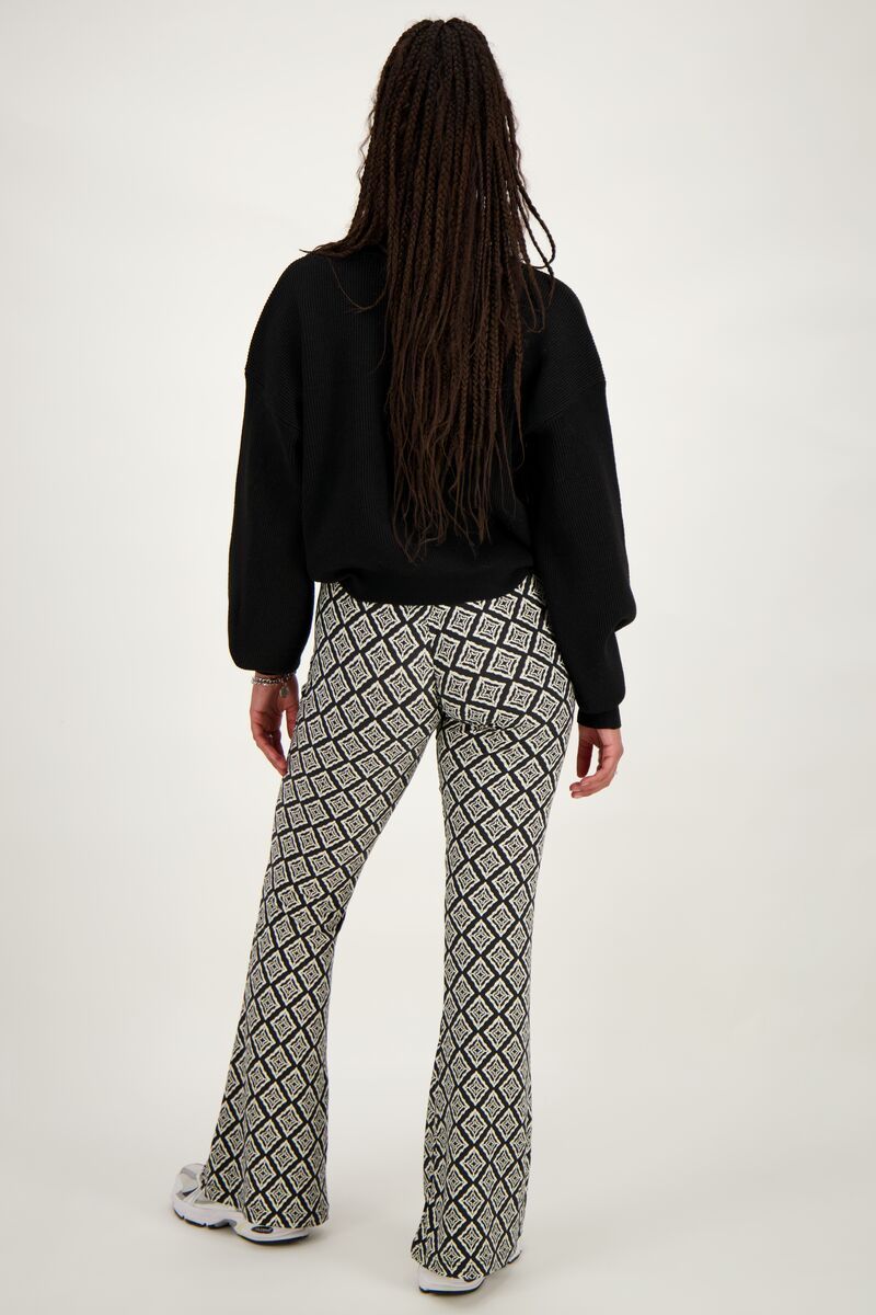 Flared pants met print sales