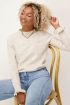 Beige trui met ruffle mouw