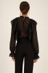 Zwarte doorschijnende blouse met ruffles | Blouses