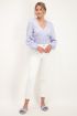 Lichtblauwe top met lange mouw en smock