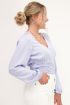 Lichtblauwe top met lange mouw en smock