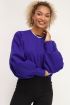 Blauwe sweater met kabels