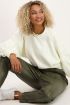 Witte sweater met kabels