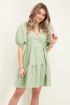 Mint groene jurk met lagen en pofmouwen