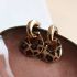 Ronde statement oorbellen met luipaard print