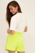 Limegroene skort met plissé | Skorts | My Jewellery