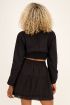 Zwarte top met pompons | My Jewellery