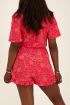 Roze bloemenprint playsuit met ruffles| My Jewellery