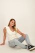 Wit mouwloos overslagvest met ruffle | My Jewellery