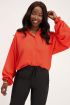 Oranje blouse met wijdvallende mouwen