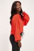 Oranje blouse met wijdvallende mouwen