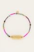 Paarse kralen armband met bedel