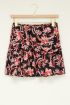 Zwart geplooide rok met bloemenprint
