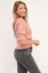 Roze top met ruffle mouw