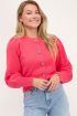 Roze vest met fantasie knoop