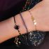 armbandje rode kraaltjes met muntjes