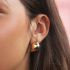 Gouden statement oorbellen, oorknoppen