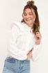 Witte blouse met doorlopende volants