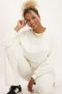 Witte sweater met ballonmouwen