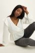 Witte wrap top met ruffles