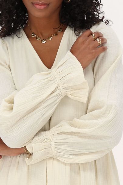 Beige jurk met elastische mouwen