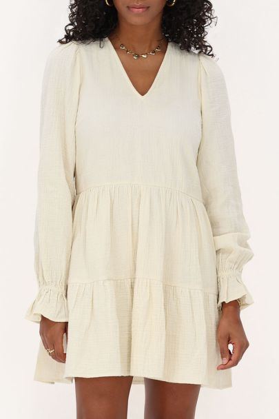 Beige jurk met elastische mouwen