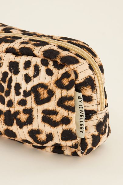 Beigefarbene Kulturtasche mit Leopardenmuster