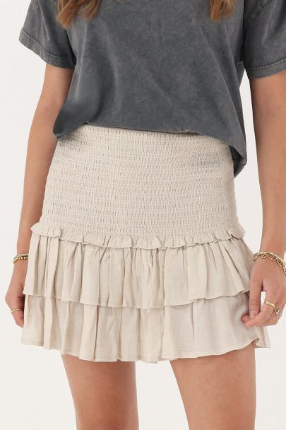 Beigefarbener Rock mit Smock