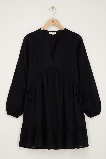 Black dress with tapes & ruffles